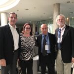 A group of cardio-oncologists posing for a photo