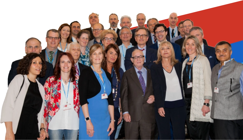 Group of IC-OS members smiling for a group photo at a conference